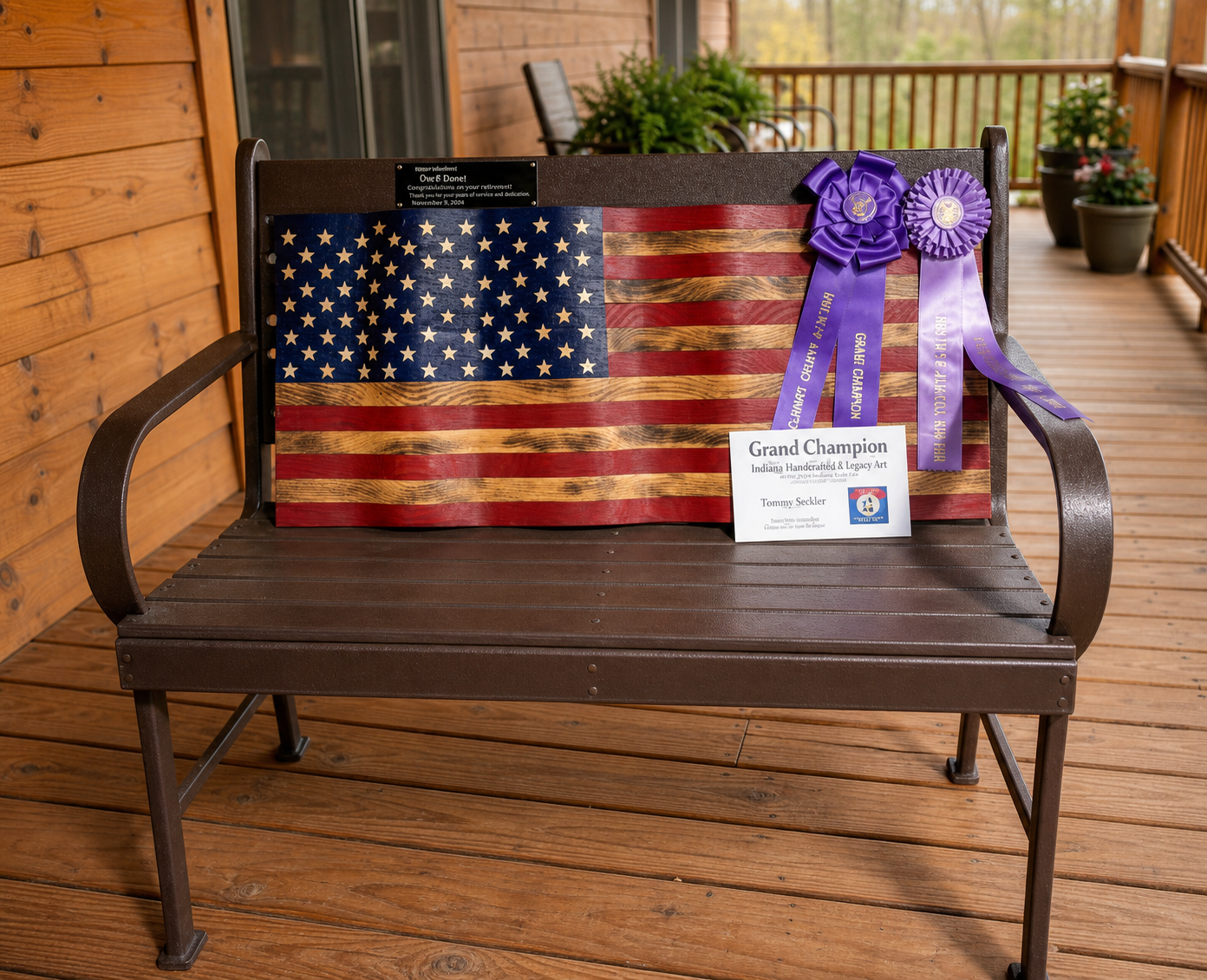 Award-winning handmade wooden American flag displayed with ribbons